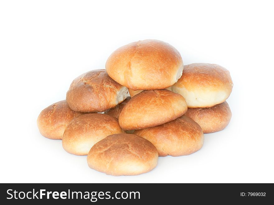 Fresh small bread on a light background. Fresh small bread on a light background