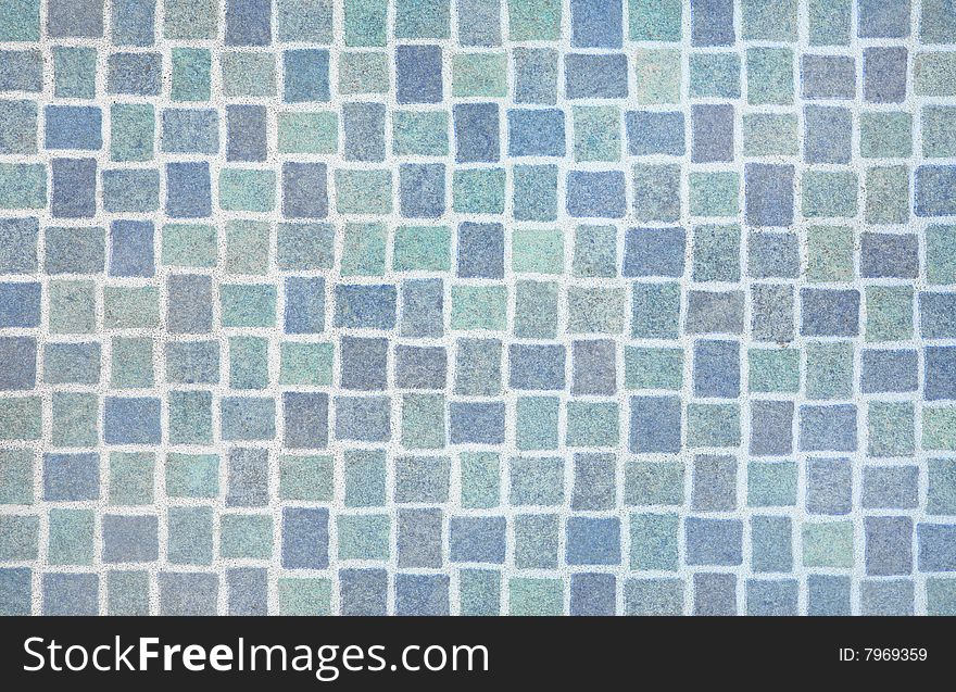 Blue mosaic tiles in a woven pattern, perfect to use as  a background. Blue mosaic tiles in a woven pattern, perfect to use as  a background