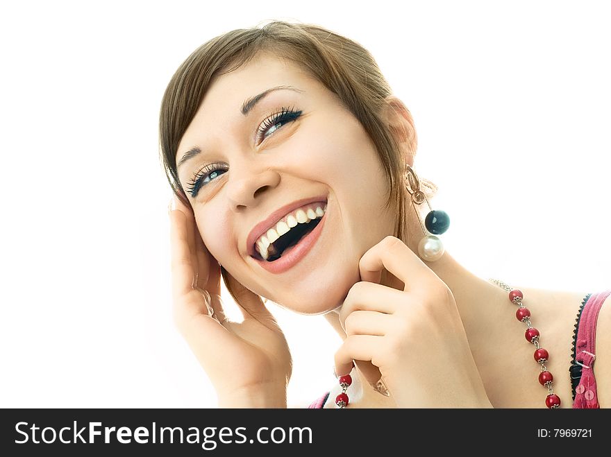 Portrait of a happy young laughing woman, isolated against white background