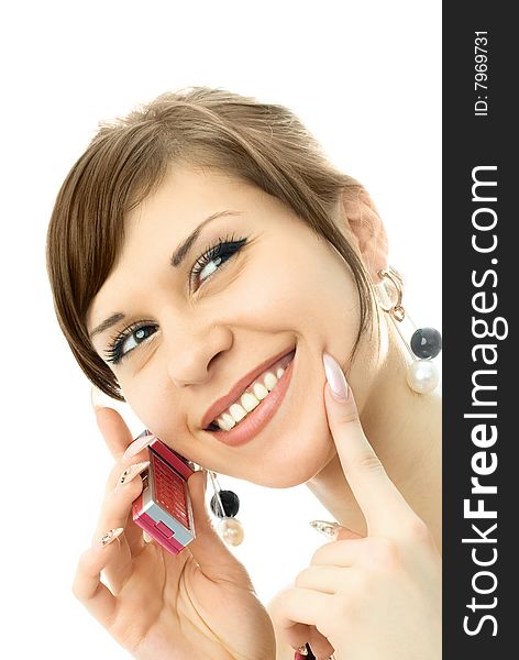 Portrait of a happy young beautiful woman talking on the cellphone