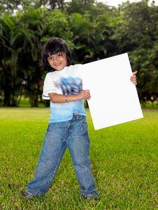 Girl With A Blank Placard In The Garden Stock Images Girl With A Blank Placard In The Garden Stock Images