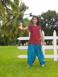 Kid In The Park With Her Toy Aeroplane Stock Photo Kid In The Park With Her Toy Aeroplane Stock Photo