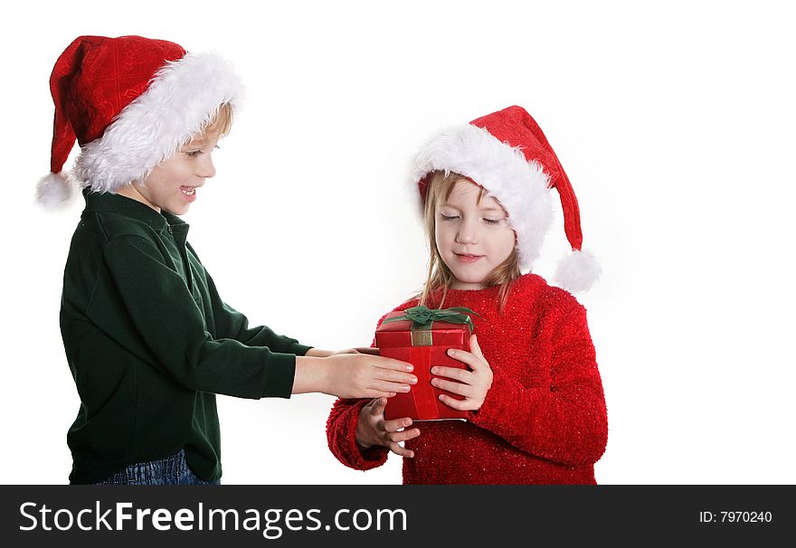 A young boy giving a girl a gift