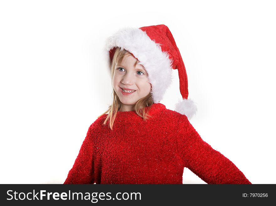 A young girl with a santa hat. A young girl with a santa hat