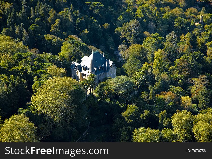 Aerial view of palace surrounded by vegetation in Sintra, Portugal. Aerial view of palace surrounded by vegetation in Sintra, Portugal