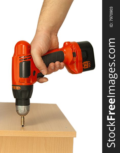 Studio shot of male hand working with drill. Studio shot of male hand working with drill