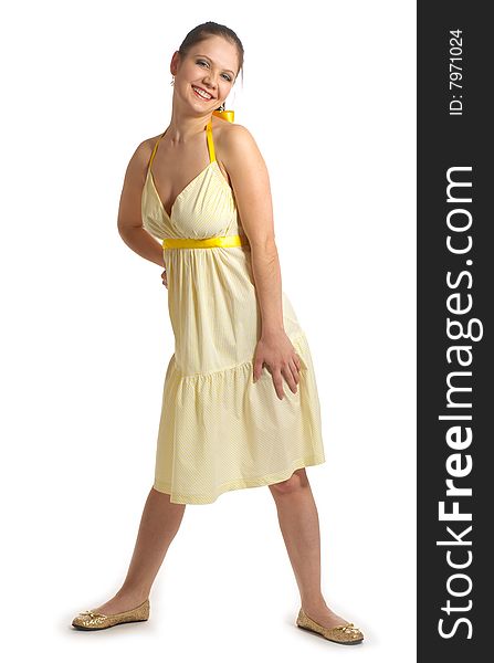 Girl in yellow dress on a white background