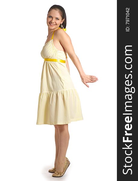 Girl in yellow dress on a white background