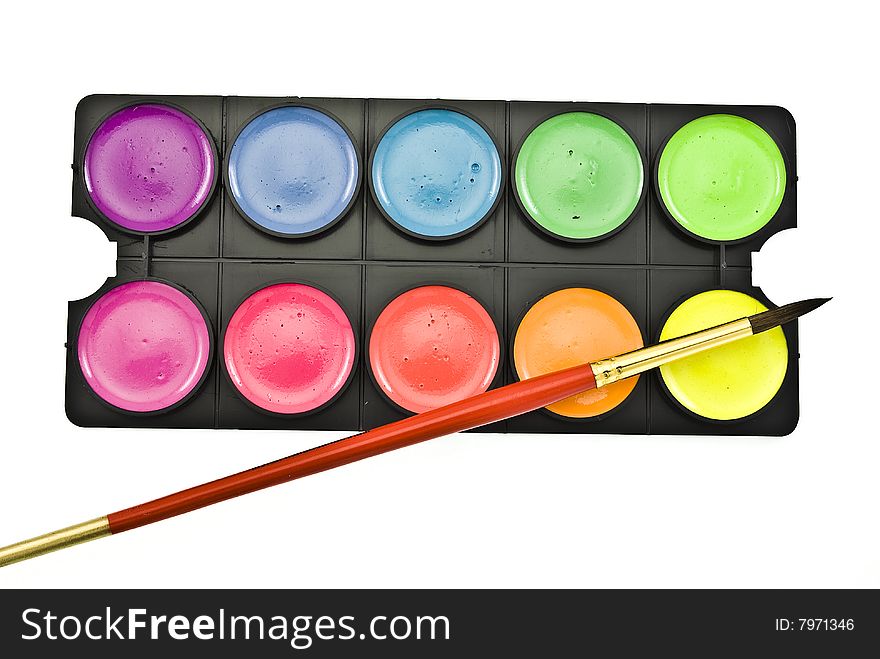 Watercolor paints set with brush on white