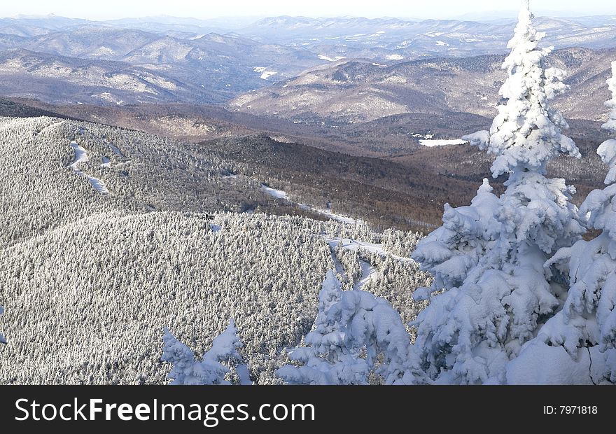 View of a chain of mountains in the winter. View of a chain of mountains in the winter.