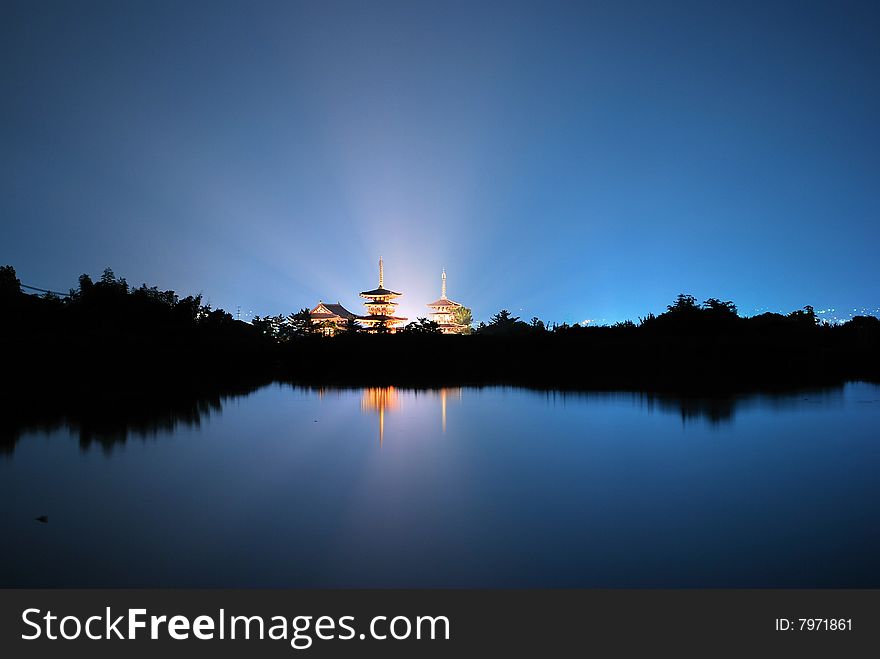 Night view of temple with light radiating, Nara, Japan