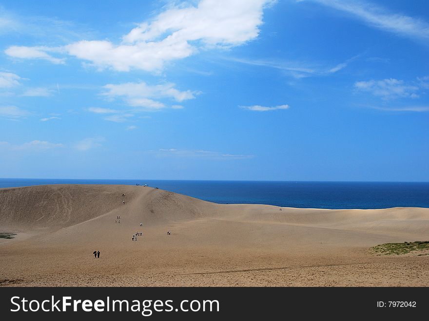 People walking in a desert. People walking in a desert