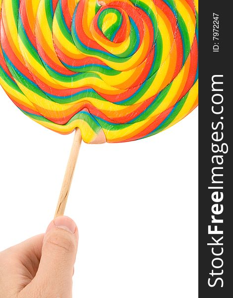 Hand holding a colorful Lollipop