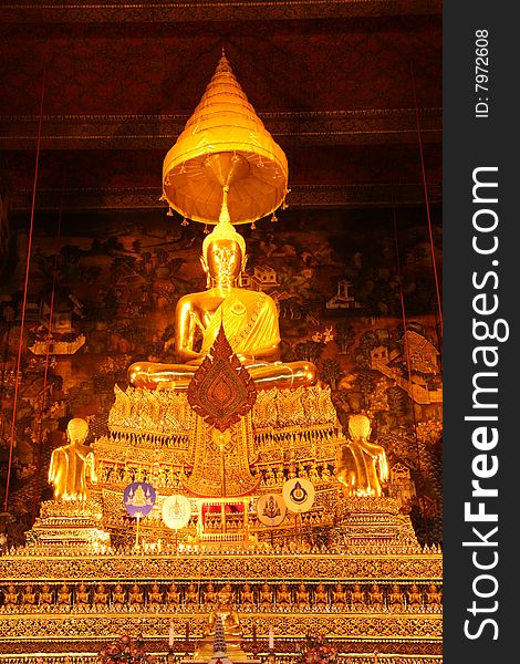 The principal Buddha Image in the main church of Wat Pho, Bangkok, Thailand. The principal Buddha Image in the main church of Wat Pho, Bangkok, Thailand.