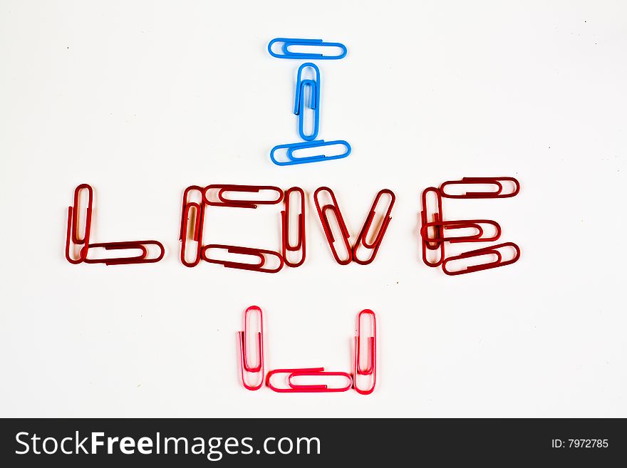 Paper clips arranged to say I Love U. Paper clips arranged to say I Love U