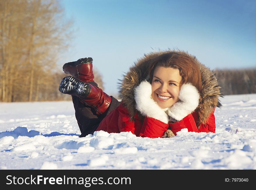 Girl Lays On Snow