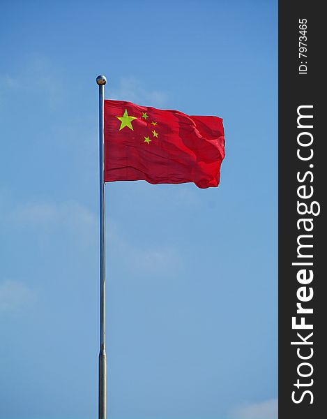 The national flag of China in the wind. The national flag of China in the wind