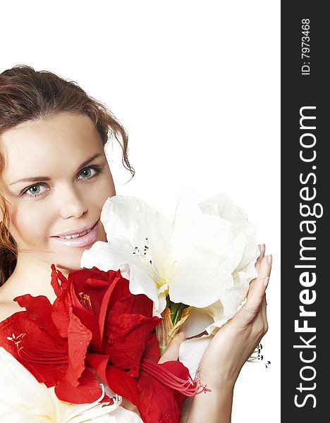 Attractive Woman Holds In Hands Flowers