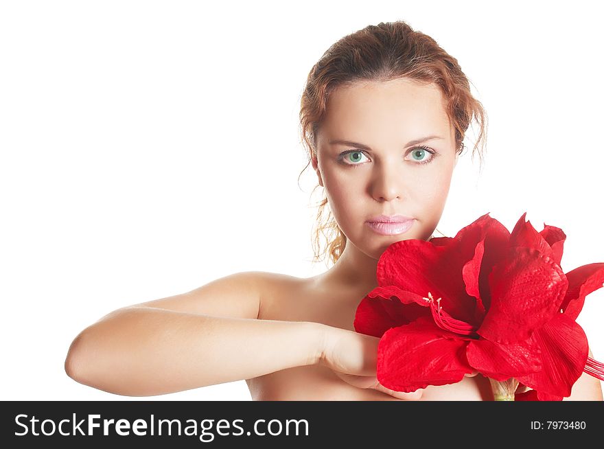 The attractive young girl with beautiful large flower. The attractive young girl with beautiful large flower