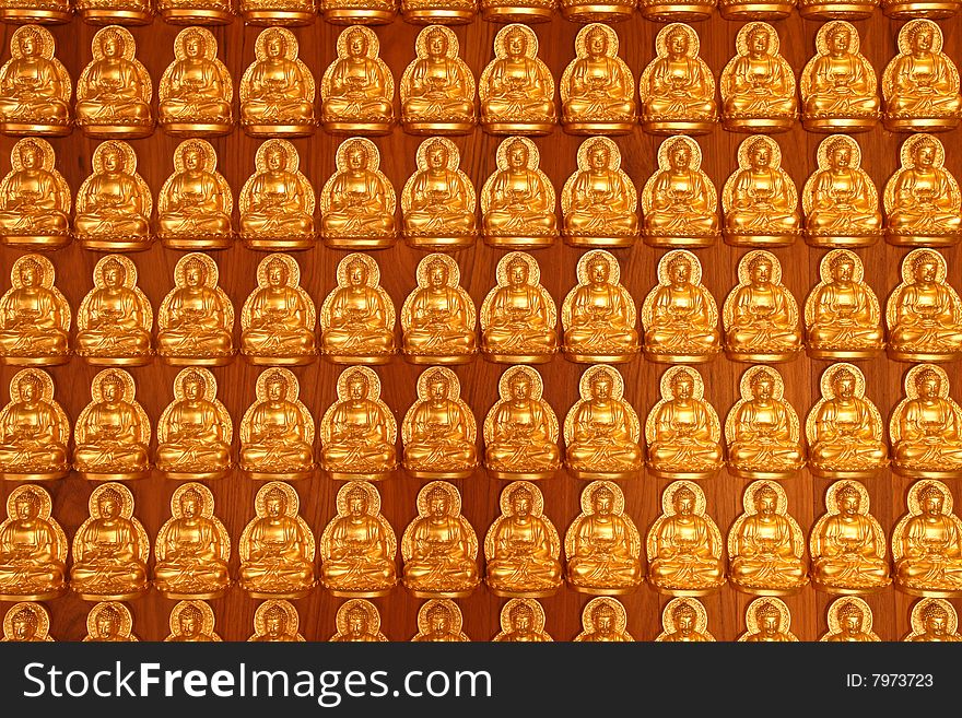 Thousand of Buddha images on the wall of pavilion in Chinese temple, Nonthaburi, Thailand. Thousand of Buddha images on the wall of pavilion in Chinese temple, Nonthaburi, Thailand.