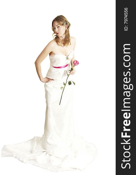 Beautiful bride sits with a red rose. Beautiful bride sits with a red rose