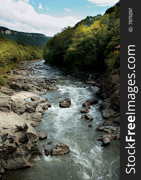 The fast cold river in mountains