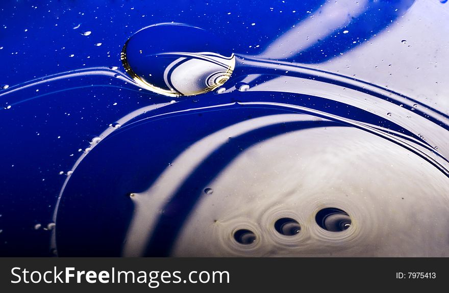 Abstract picture of liquid on coloured background. Abstract picture of liquid on coloured background