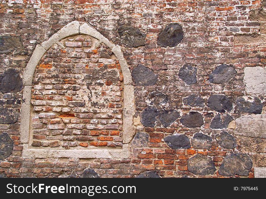 Wall out of Brick and several natural Stone Materials. Wall out of Brick and several natural Stone Materials