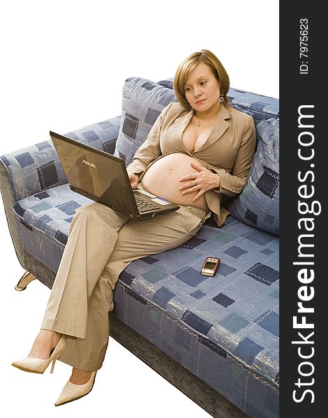 Young pregnancy woman worked at home with notebook and mobile phone. Young pregnancy woman worked at home with notebook and mobile phone