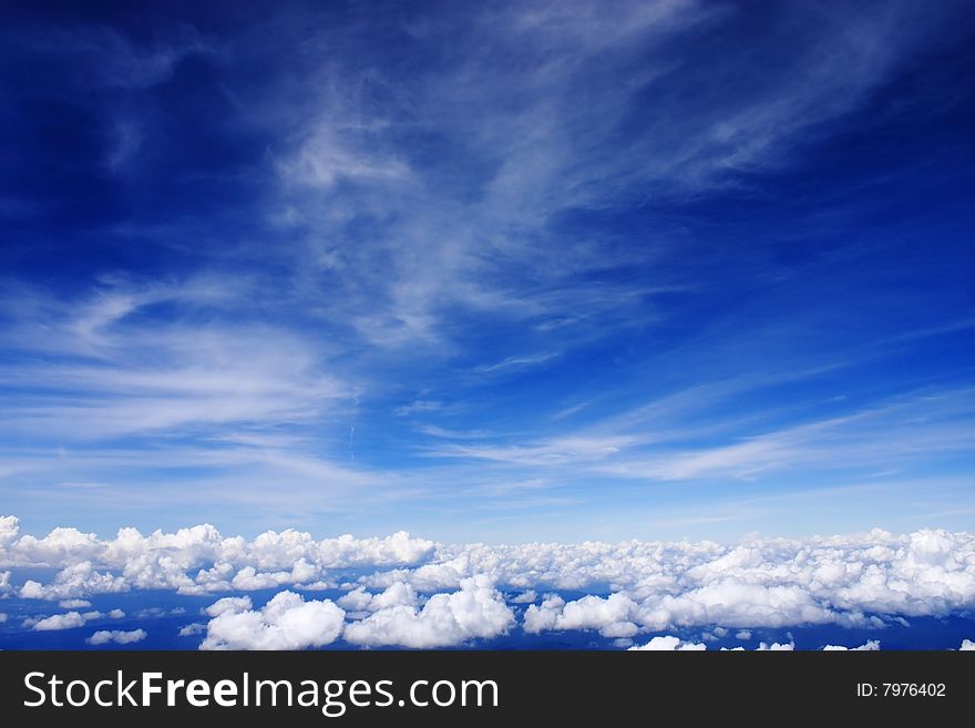 Cloudy blue sky on a sunny day. Cloudy blue sky on a sunny day.