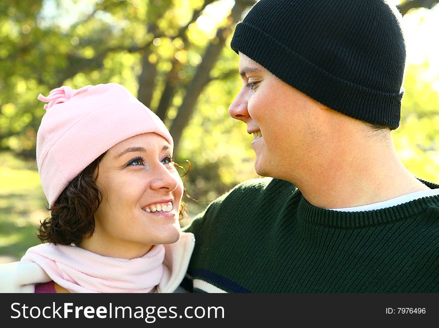 Young Happy Couple Looking At Each Other