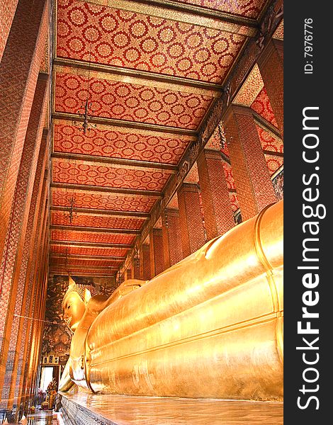 One of the most famous Buddha image in Thailand. The reclining Buddha of Wat Pho, Bangkok, Thailand. One of the most famous Buddha image in Thailand. The reclining Buddha of Wat Pho, Bangkok, Thailand.