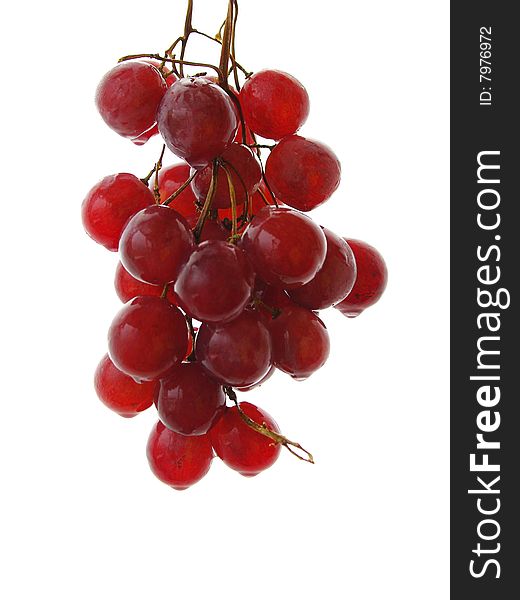 A bunch of red grapes isolated on white background