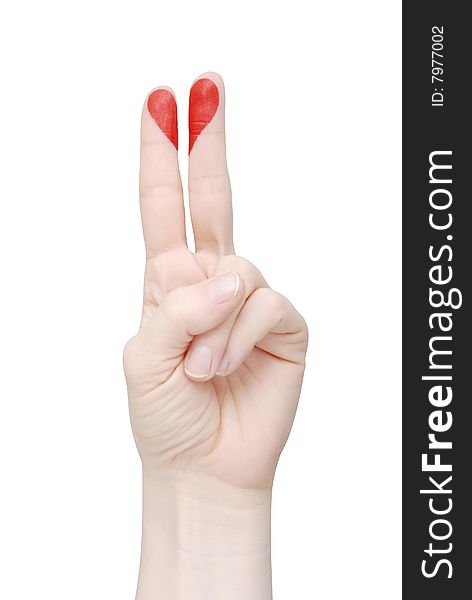 Red heart drawn on fingers on a white background (isolated)