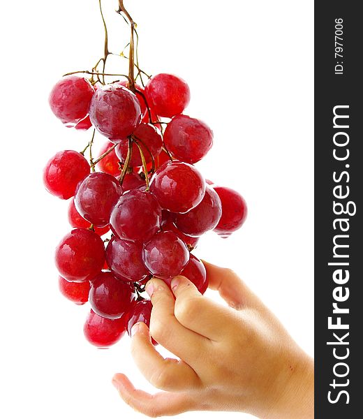 A bunch of red grapes and white
