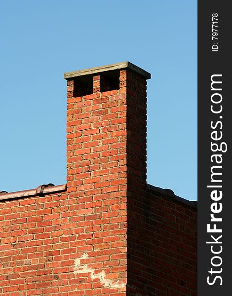 A chimney on the exterior of a building