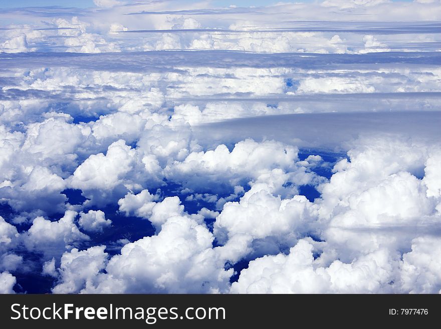 Cloudy blue sky on a sunny day. Cloudy blue sky on a sunny day.