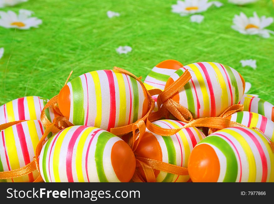 Painted Colorful Easter Eggs on green Grass