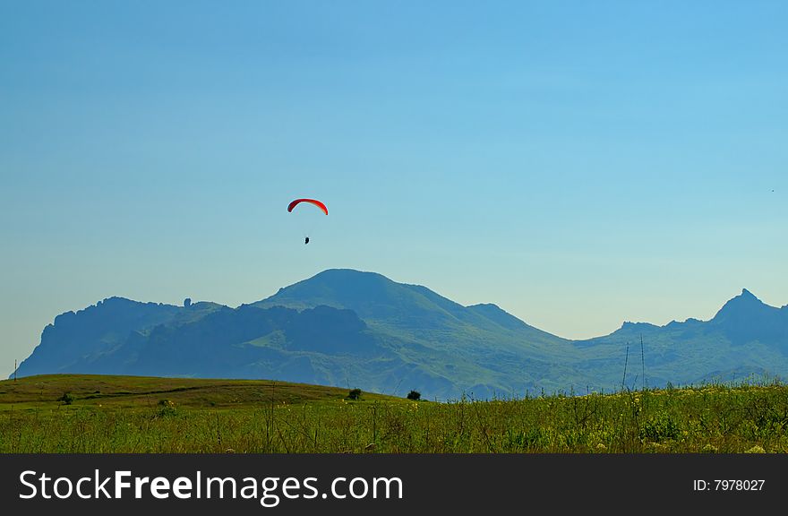 Landscape with parachuter in Crimea, Ukraine