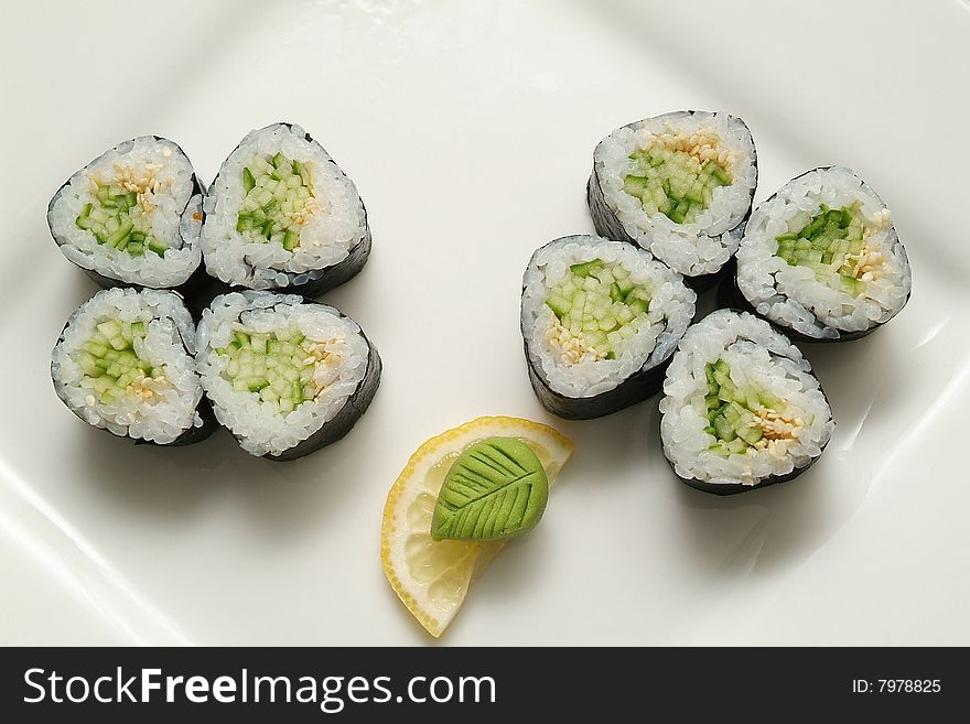 Traditional the Japanese meal sushi on a white background