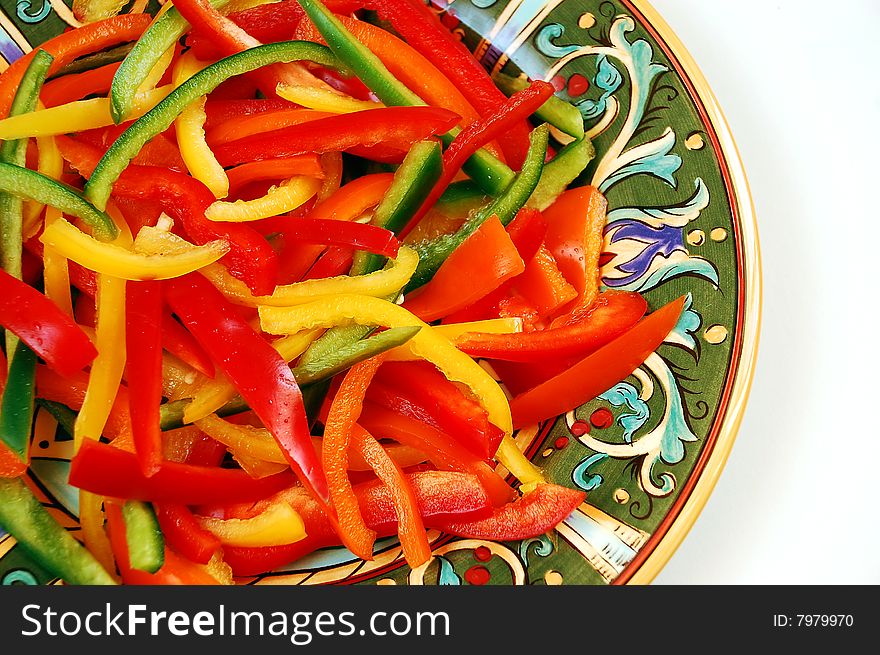 Colorful sliced pepper stir-fry on plate. Colorful sliced pepper stir-fry on plate
