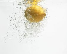 Lemon Is Dropped Into Clean Water 2. Stock Image Lemon Is Dropped Into Clean Water 2. Stock Image