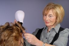 Attractive Older Lady Hair Stylist Stock Photos Attractive Older Lady Hair Stylist Stock Photos