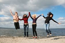 Girls Having Fun At The Beach Stock Image