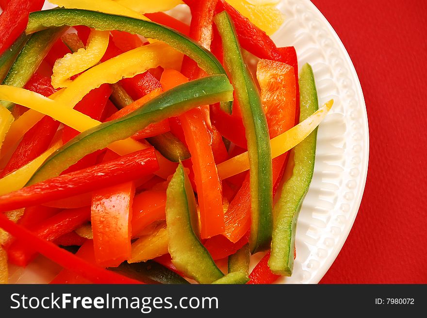 Colorful sliced pepper stir-fry on plate. Colorful sliced pepper stir-fry on plate