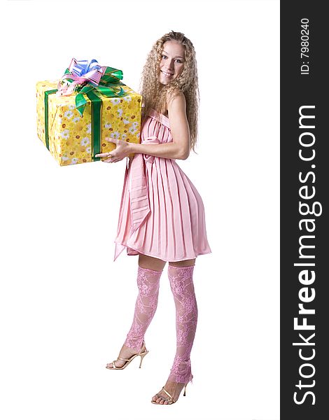 The young beautiful girl with purchases in colour packages during shopping on a white background