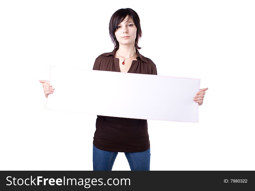 The young beautiful businesswoman at office behind work on a white background. The young beautiful businesswoman at office behind work on a white background