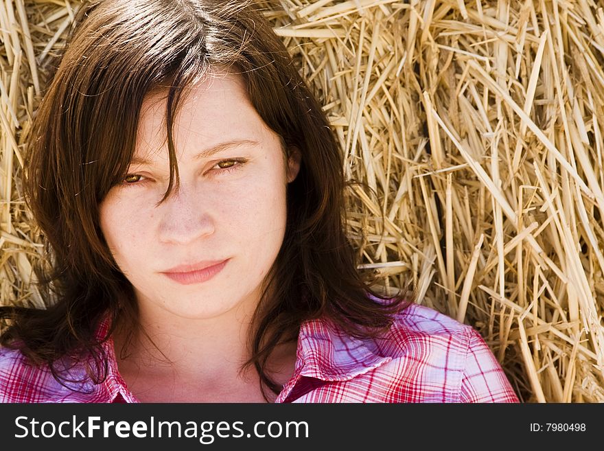 Young Woman In Haystack