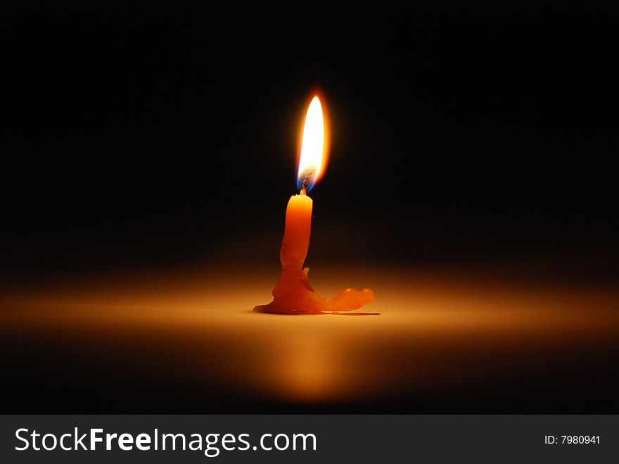 The bright candle disperses darkness