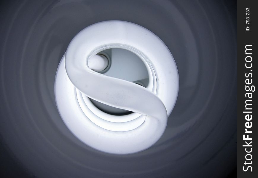 Close up of fluorescent energy saving bulb. Close up of fluorescent energy saving bulb.